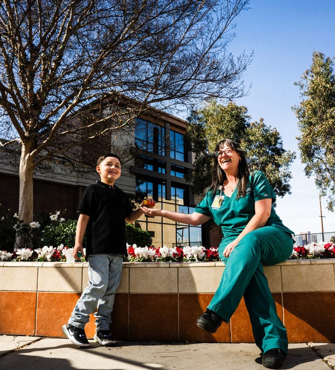 Adrian Preciado and pediatric speech language therapist Tracy Coleite